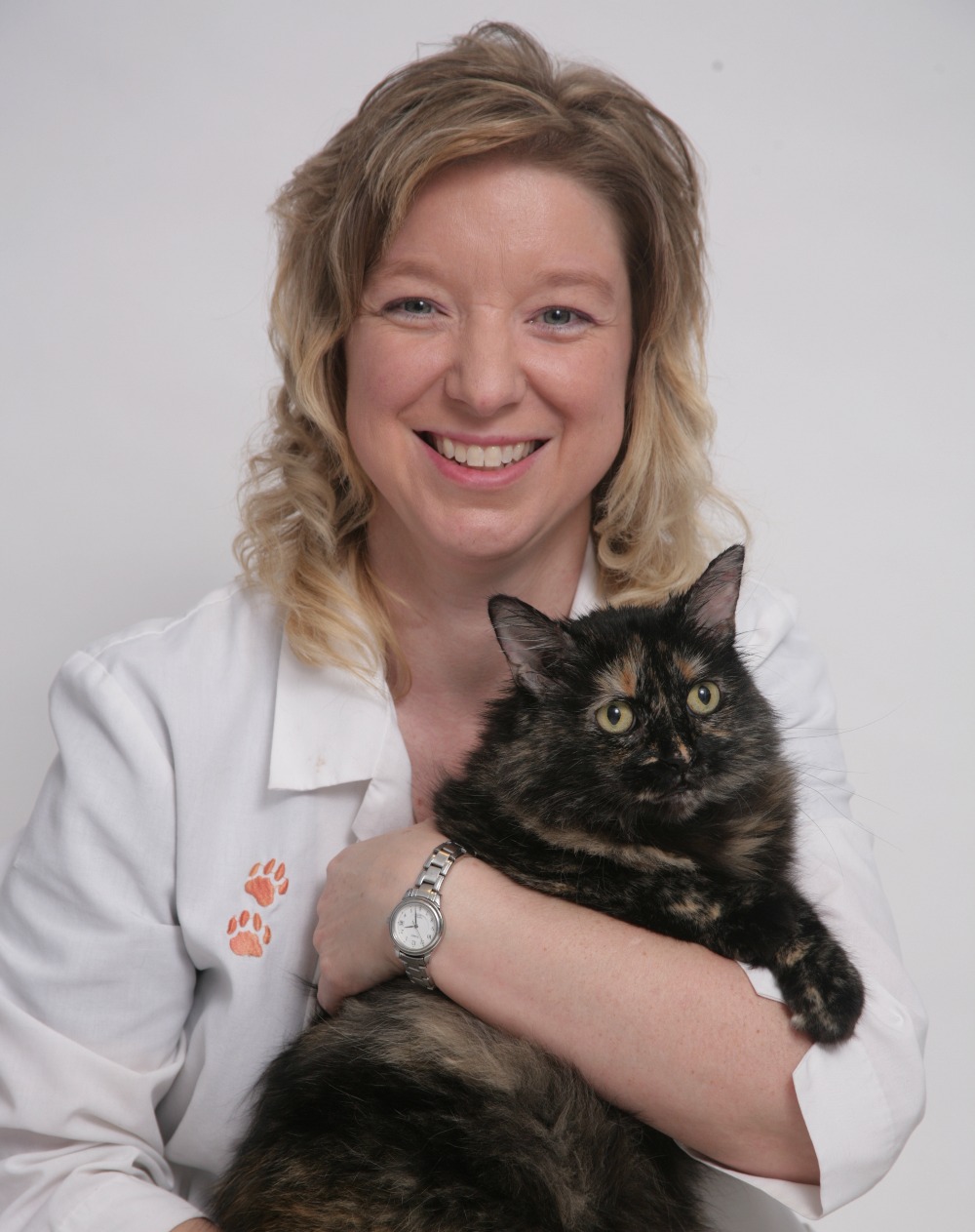 Dr. Cat McGinnis with a patient at American Heritage Animal Hospital